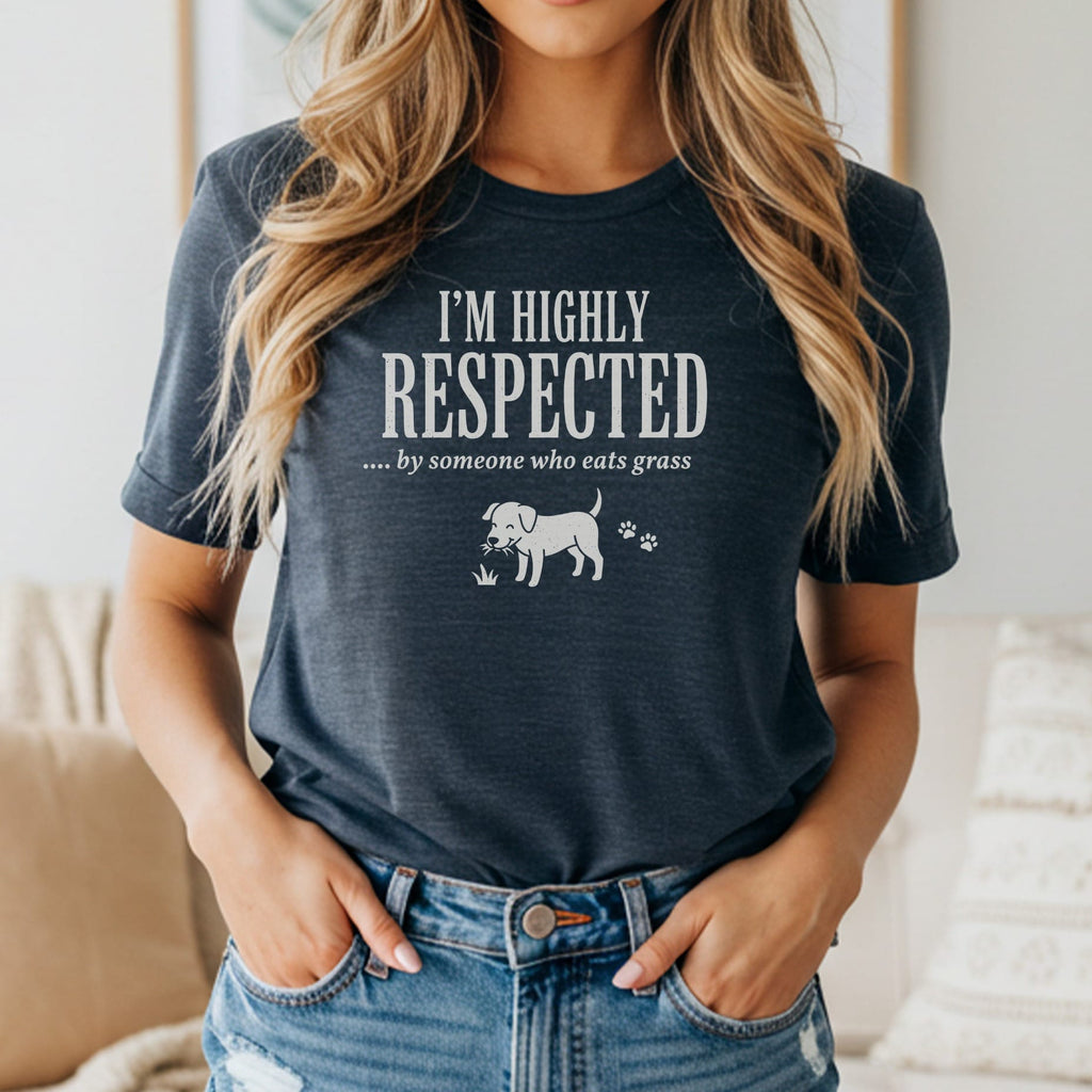 Dark t-shirt with text "I'M HIGHLY RESPECTED .... by someone who eats grass" and dog graphic.