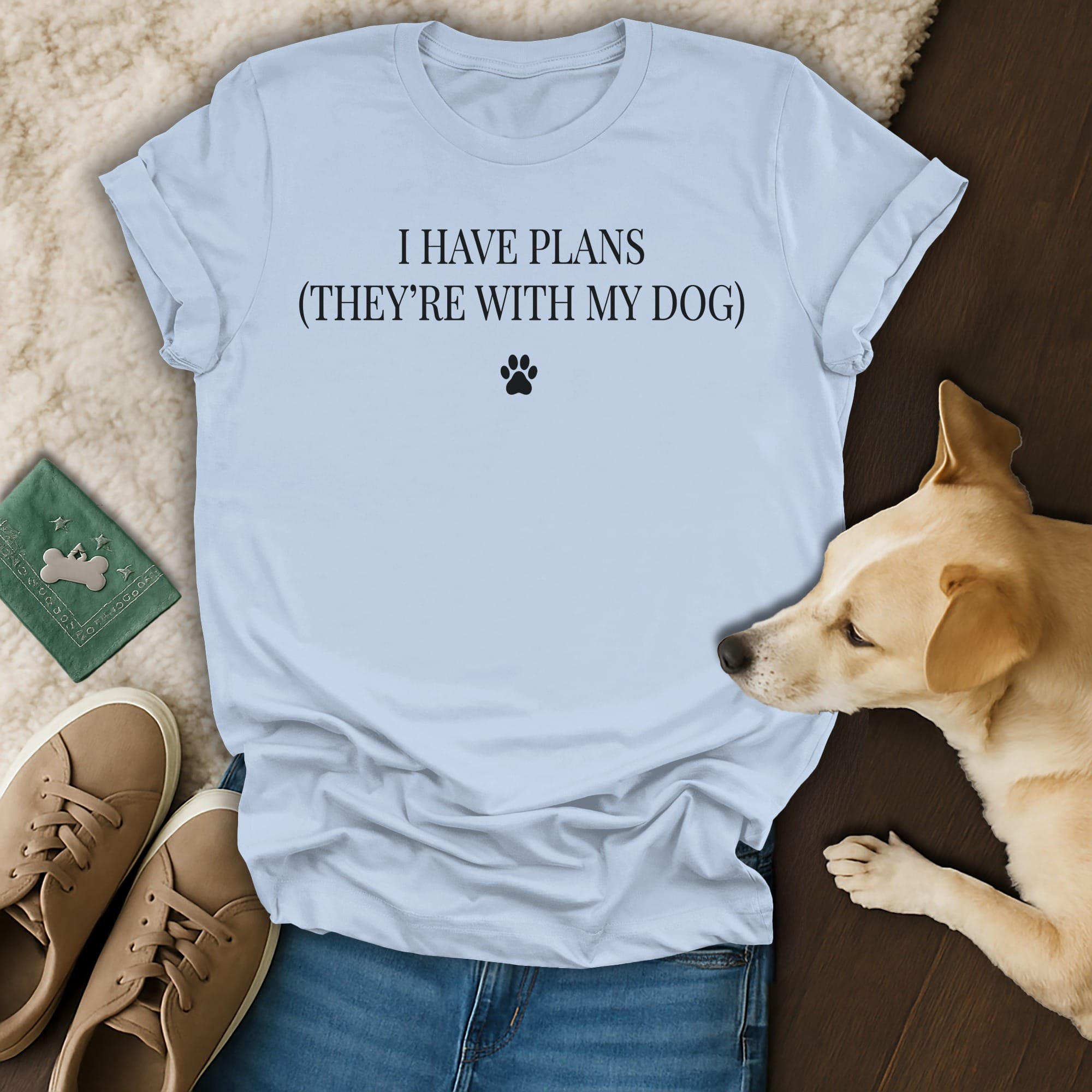 Light blue t-shirt with text "I HAVE PLANS (THEY'RE WITH MY DOG)" and paw print.