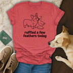 Coral t-shirt with a corgi and duck illustration and text "ruffled a few feathers today".
