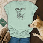Light green t-shirt with "Chili Dog" text and a dog wearing a scarf and earmuffs.