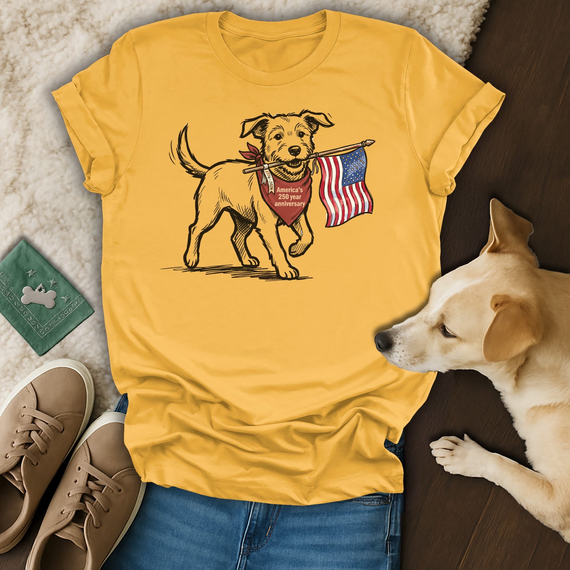 Yellow t-shirt with a dog carrying an American flag and text "America's 250 Year Anniversary".