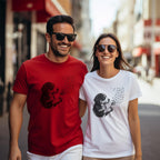 Couple wearing matching t-shirts with dog and dandelion graphic.