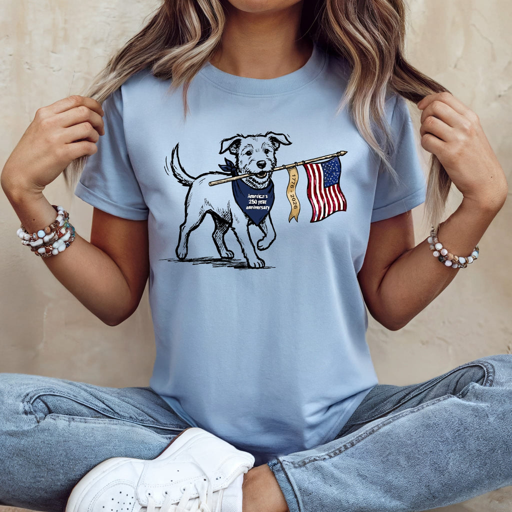 Dog wearing bandana and holding American flag, text "America's 250th Anniversary".
