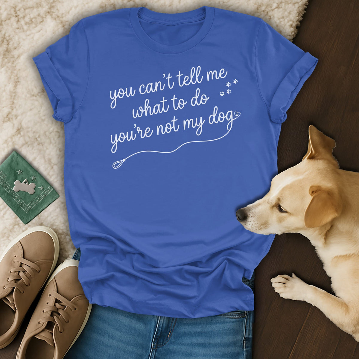 Blue t-shirt with white text "you can't tell me what to do you're not my dog".