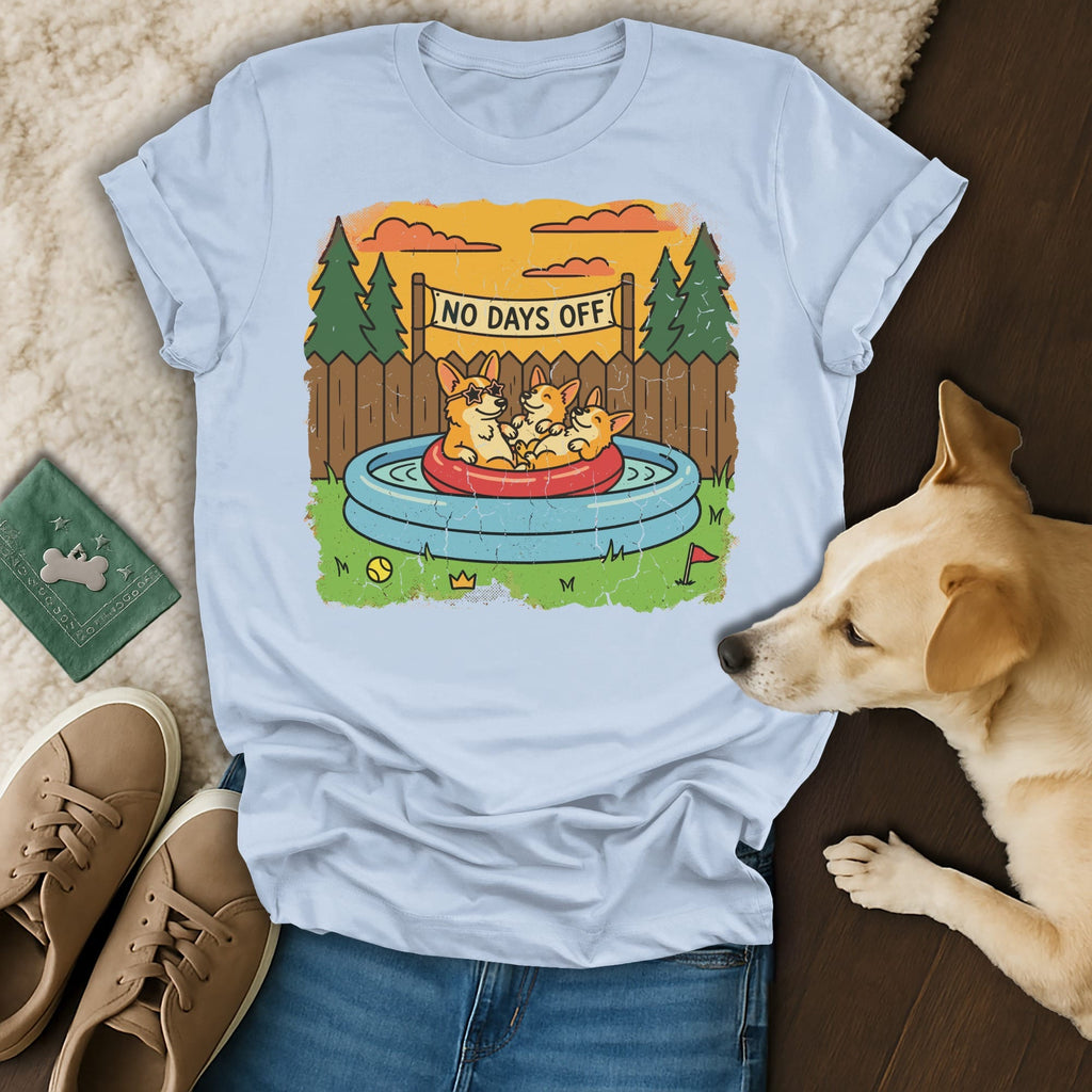 T-shirt with three corgis in an inflatable pool, text "NO DAYS OFF".