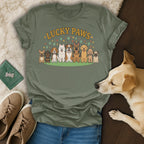 T-shirt with cartoon dogs and "Lucky Paws" text.