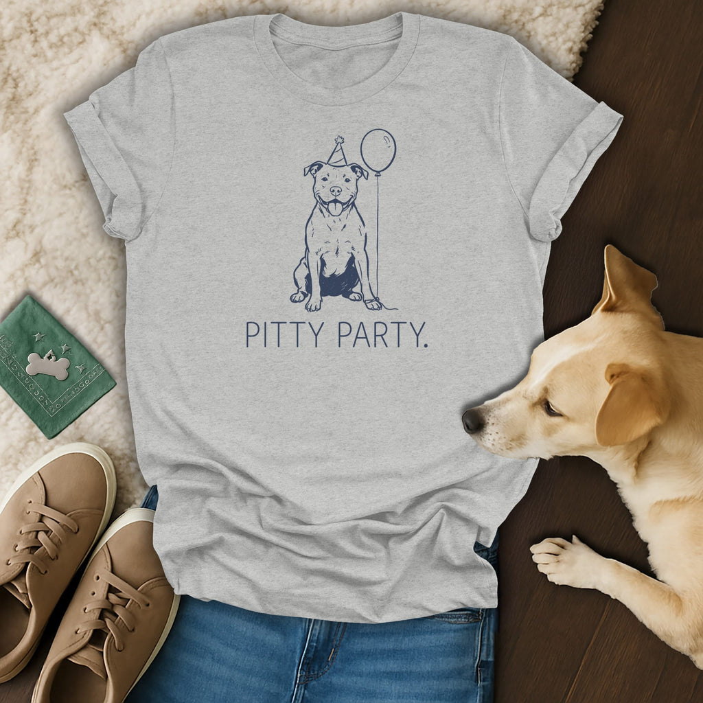 Grey t-shirt with a line drawing of a happy pitbull wearing a party hat and holding a balloon.