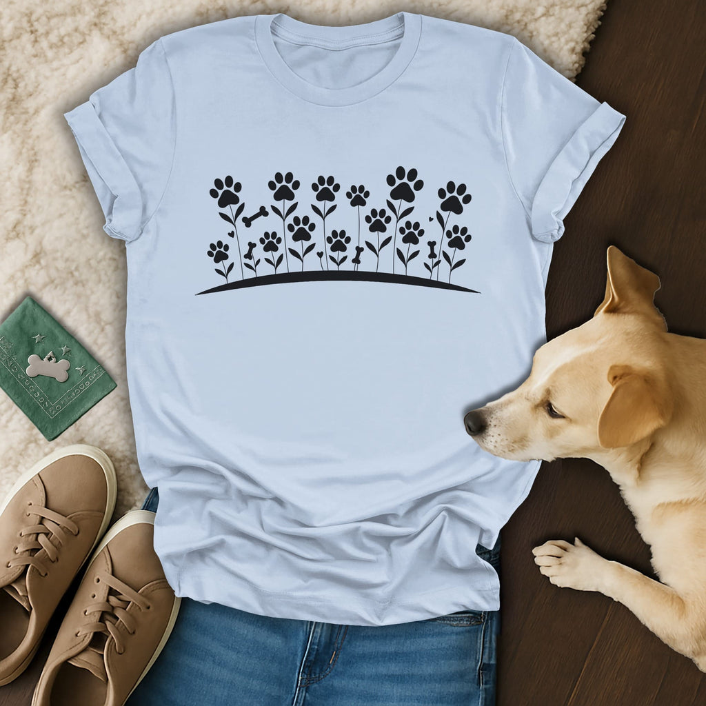 Light blue t-shirt with black paw print and bone floral design.