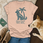 Peach t-shirt with teal dog and palm tree graphic that reads "Island Heart DOG SOUL".