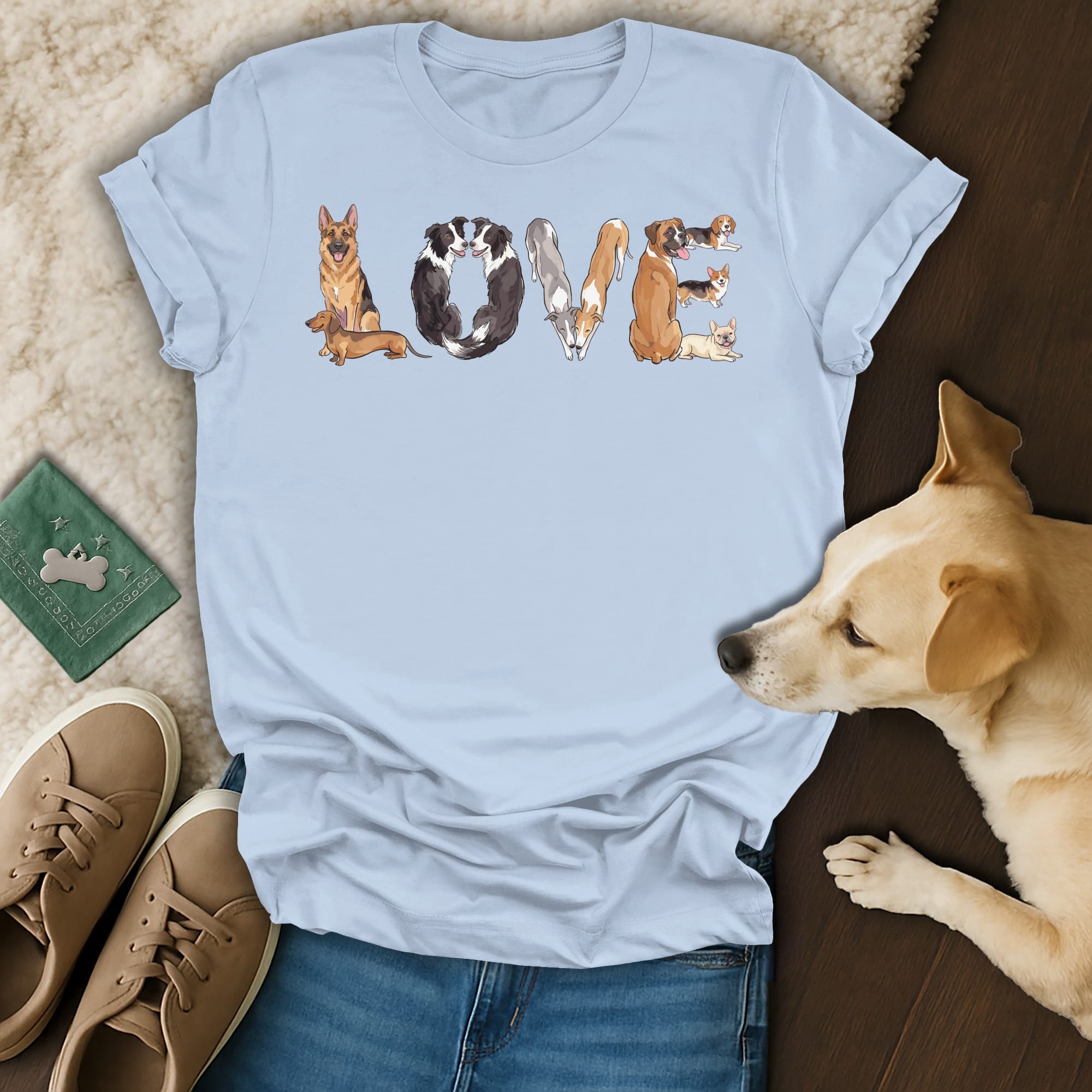 Light blue t-shirt with dogs forming the word LOVE across the chest.