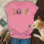 Pink t-shirt with dogs forming the word LOVE.
