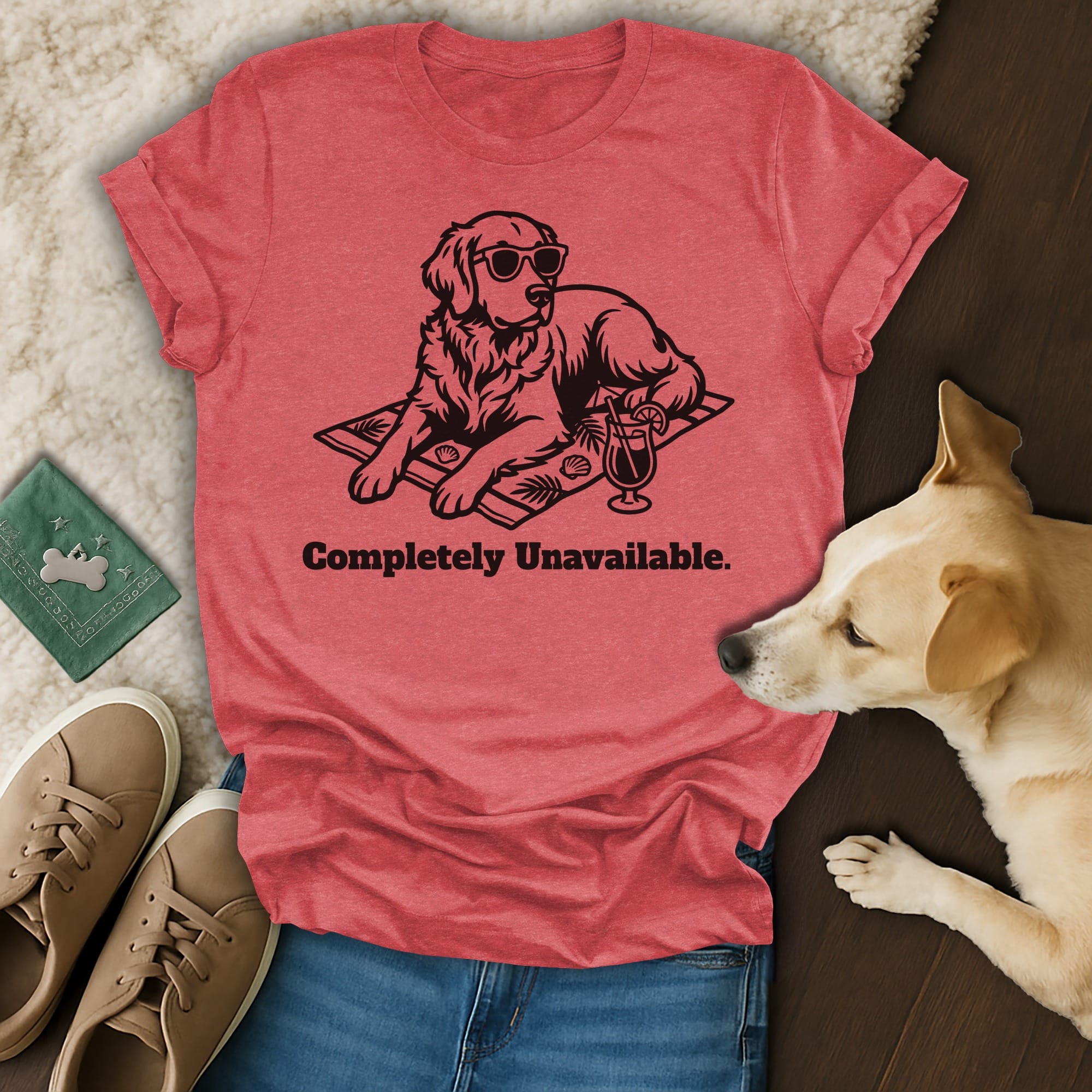 Red t-shirt with sunglasses-wearing dog on a beach towel, text "Completely Unavailable."