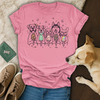 Five dogs in a line holding ice cream cones, on a pink t-shirt.