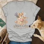 Heather gray V-neck t-shirt featuring a corgi in a floral teacup and the text Steeped in Love.