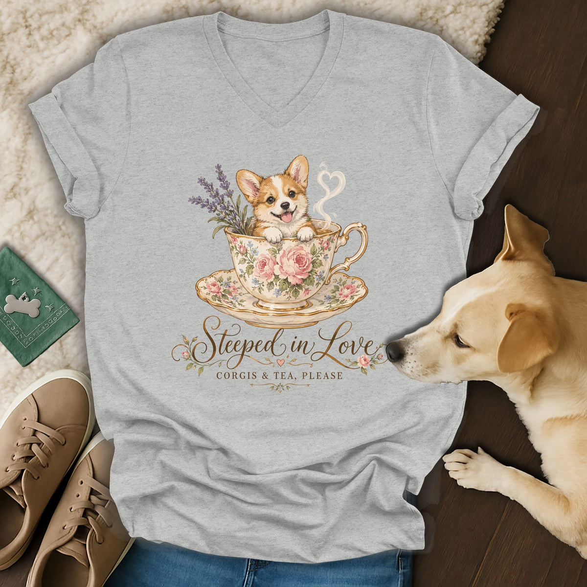 Heather gray V-neck t-shirt featuring a corgi in a floral teacup and the text Steeped in Love.