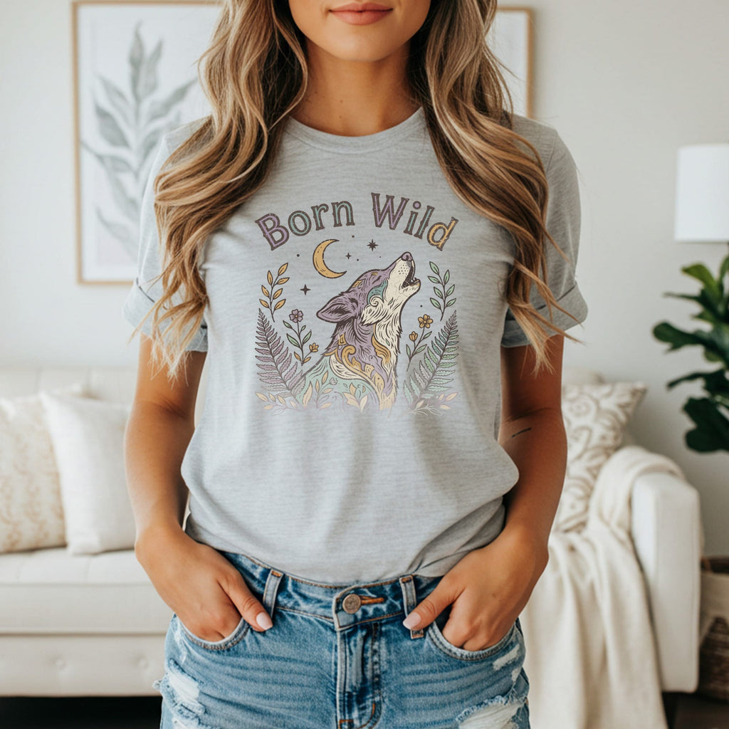 Gray t-shirt with "Born Wild" text above a colorful howling wolf and floral design.