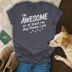 Dark gray t-shirt with white text: "I'M AWESOME or at least my dog thinks I am".