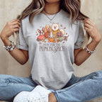 Grey t-shirt graphic with four dogs and "Here fur the pupkin spice" text.