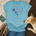 Blue t-shirt with a heart graphic featuring paw prints and stars, with "250 America" text.