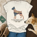 White t-shirt with Boxer dog silhouette containing American flag and patriotic scene.