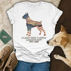 Boxer dog silhouette with American flag inside, overlaid with "Land That I Love".