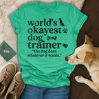 Green t-shirt with "World's Okayest Dog Trainer" text and a dog.