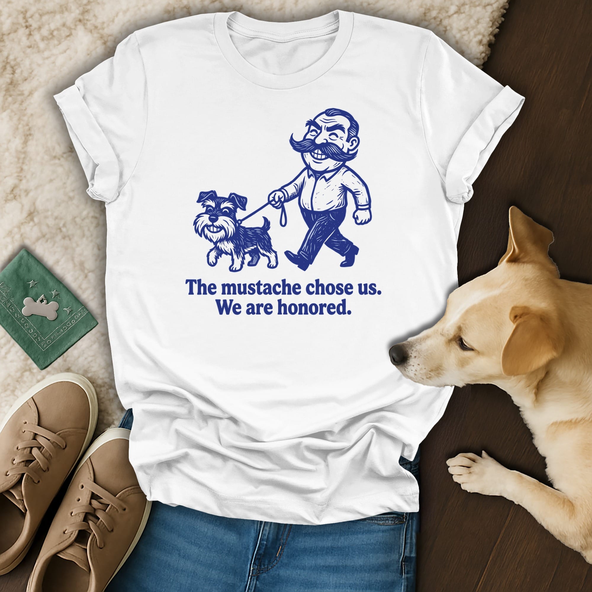 T-shirt with cartoon of man walking dog, text: The mustache chose us. We are honored.