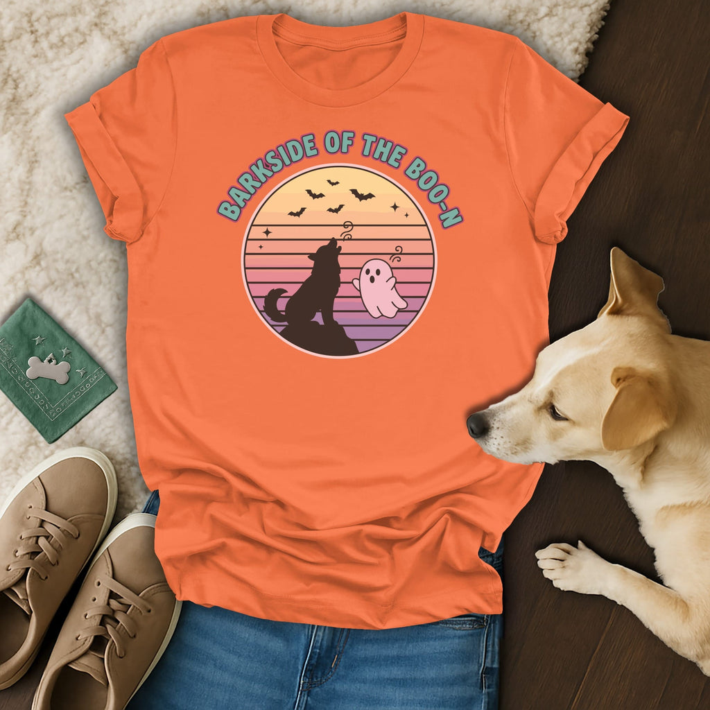 Orange t-shirt with a circular graphic of a howling wolf and ghost, reading "Barkside of the Boo-n".