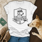 White t-shirt with a dog wearing a captain's hat, "Paws of the Helm" text, and anchor.