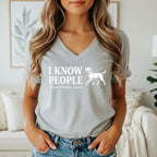 Grey v-neck t-shirt with white text "I KNOW PEOPLE the ones with dogs, anyway" and a dog graphic.