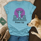 T-shirt with dancing dog graphic and "Paws Up" text.
