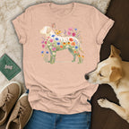 Peach t-shirt with a labrador silhouette filled with colorful flowers and a butterfly.