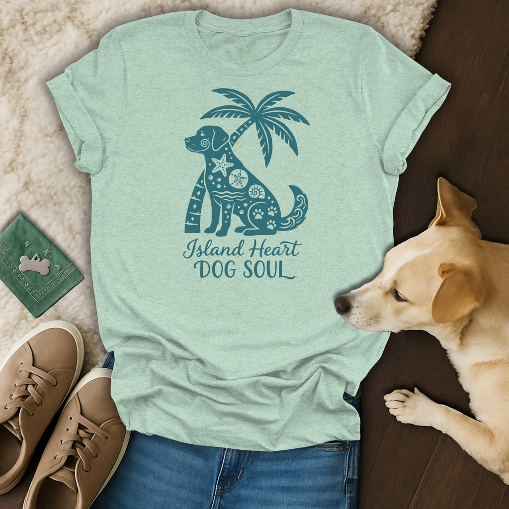Light blue t-shirt with a teal graphic of a dog, palm tree, and beach elements.