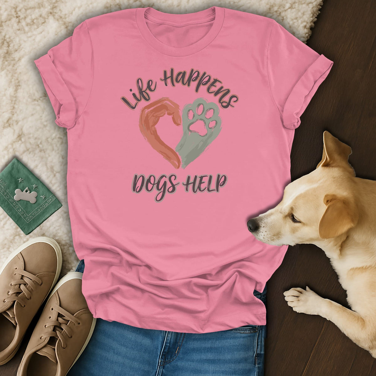 Pink t-shirt with "Life Happens Dogs Help" text and heart design.