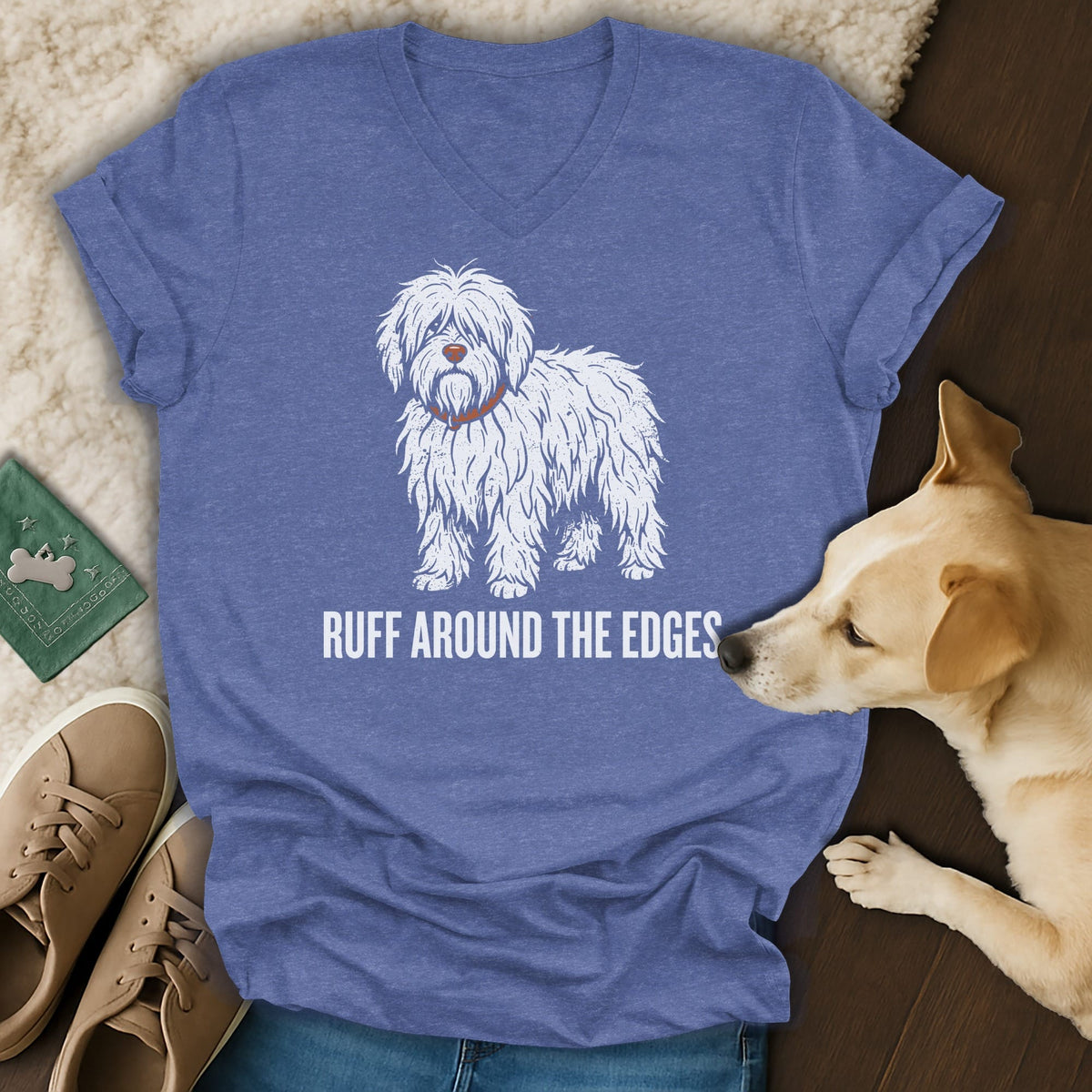 Blue v-neck t-shirt with white shaggy dog graphic and text "RUFF AROUND THE EDGES".