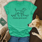 Green t-shirt with a dog outline and "Follow Your Heart" text.