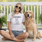 Woman wearing white t-shirt with corgi graphic and "dog-related nonsense" text.
