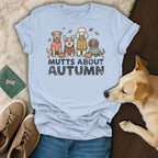 Light blue t-shirt with four dogs and pumpkins, reads "Mutts About Autumn."