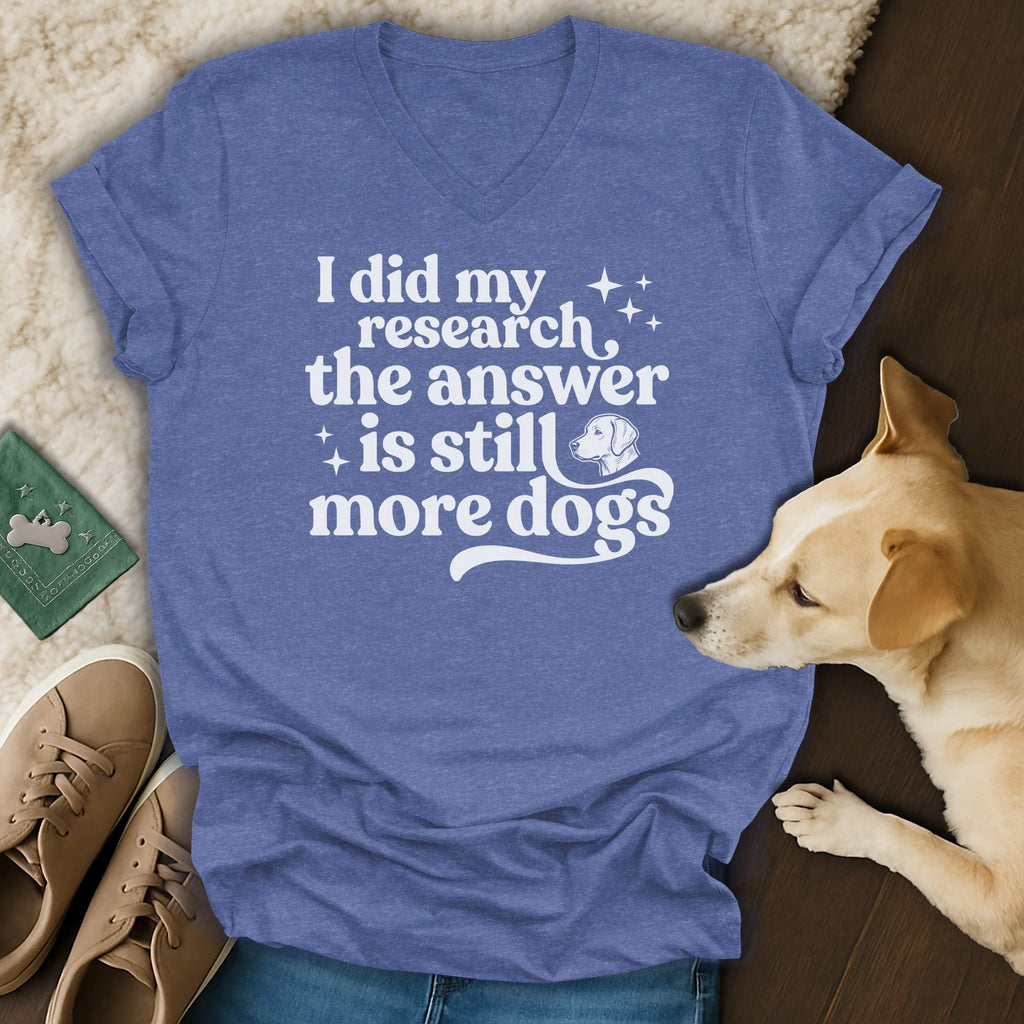 Blue t-shirt with white text "I did my research the answer is still more dogs".