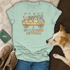 Light teal t-shirt with cartoon dogs in a wagon and "Hay There Autumn" text.