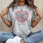 Gray t-shirt with heart maze graphic, dog image, and text "START" and "EVERY PAW LEADS TO LOVE".