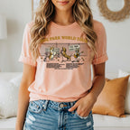 T-shirt with cartoon dogs on a dog park tour with text details.