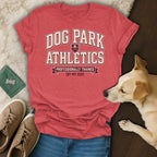 Red t-shirt with "Dog Park Athletics" and "Professionally Trained (By My Dog)" text.