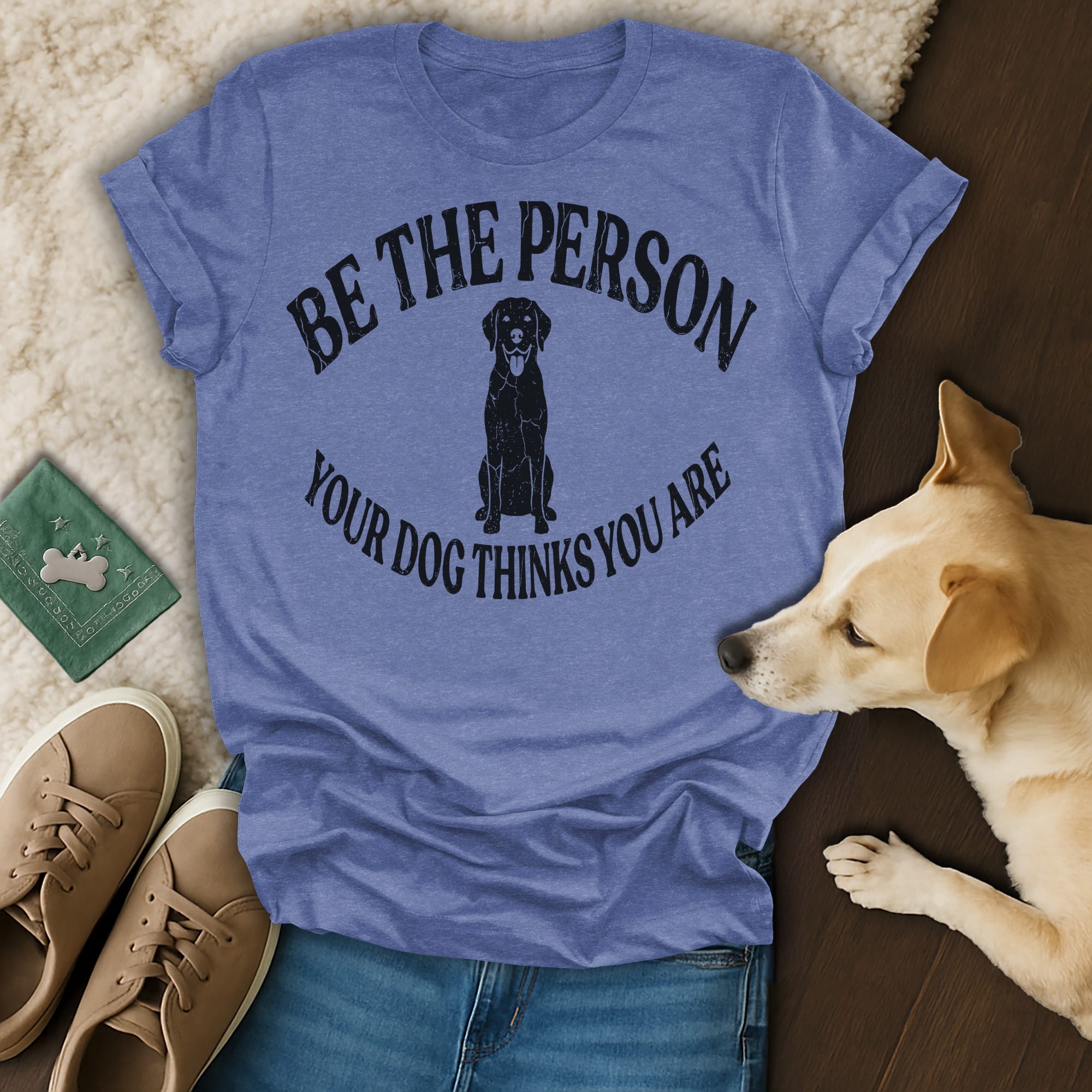 Blue t-shirt with black dog graphic and text "BE THE PERSON YOUR DOG THINKS YOU ARE".