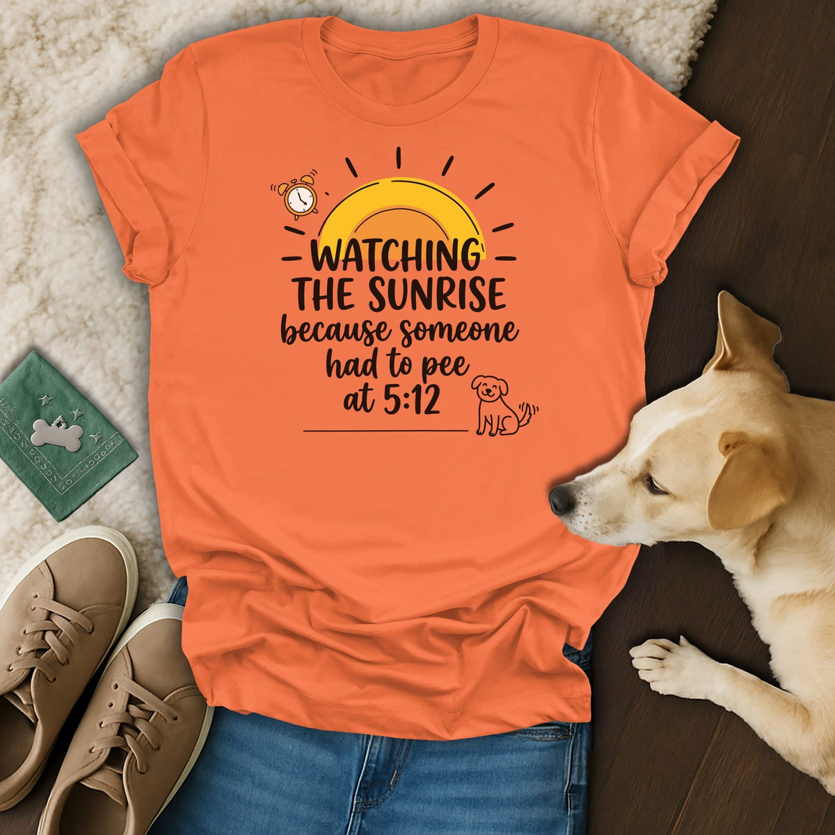 Orange t-shirt with "Watching the sunrise because someone had to pee at 5:12" text.