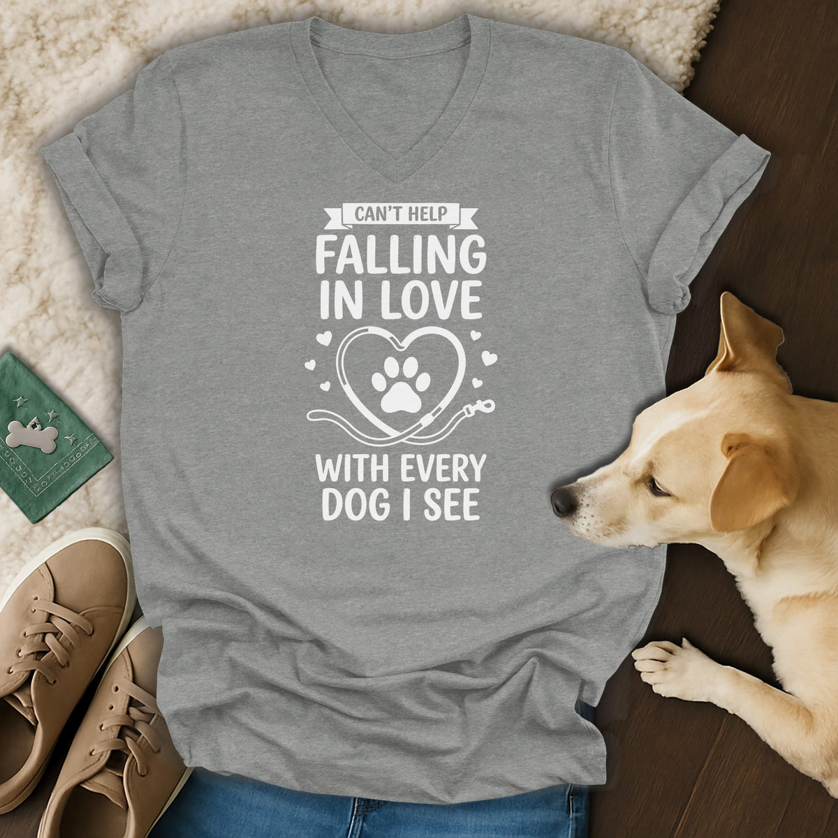 Grey v-neck t-shirt with white text: "Can't Help Falling In Love With Every Dog I See."