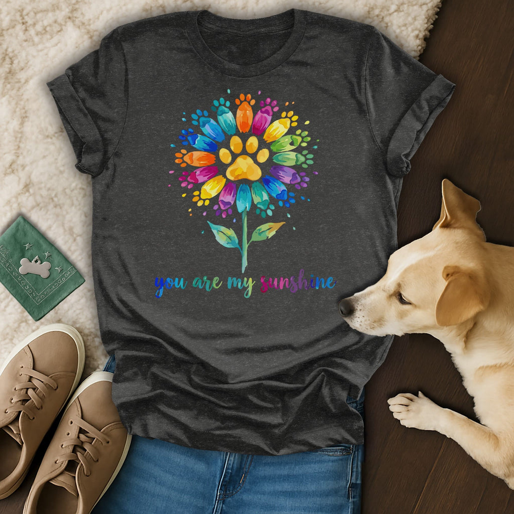 Dark t-shirt with colorful flower paw print and "you are my sunshine" text.