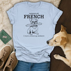 Light blue t-shirt with French bulldog, baguette, and text: "PARDON MY FRENCH I have pressing matters".