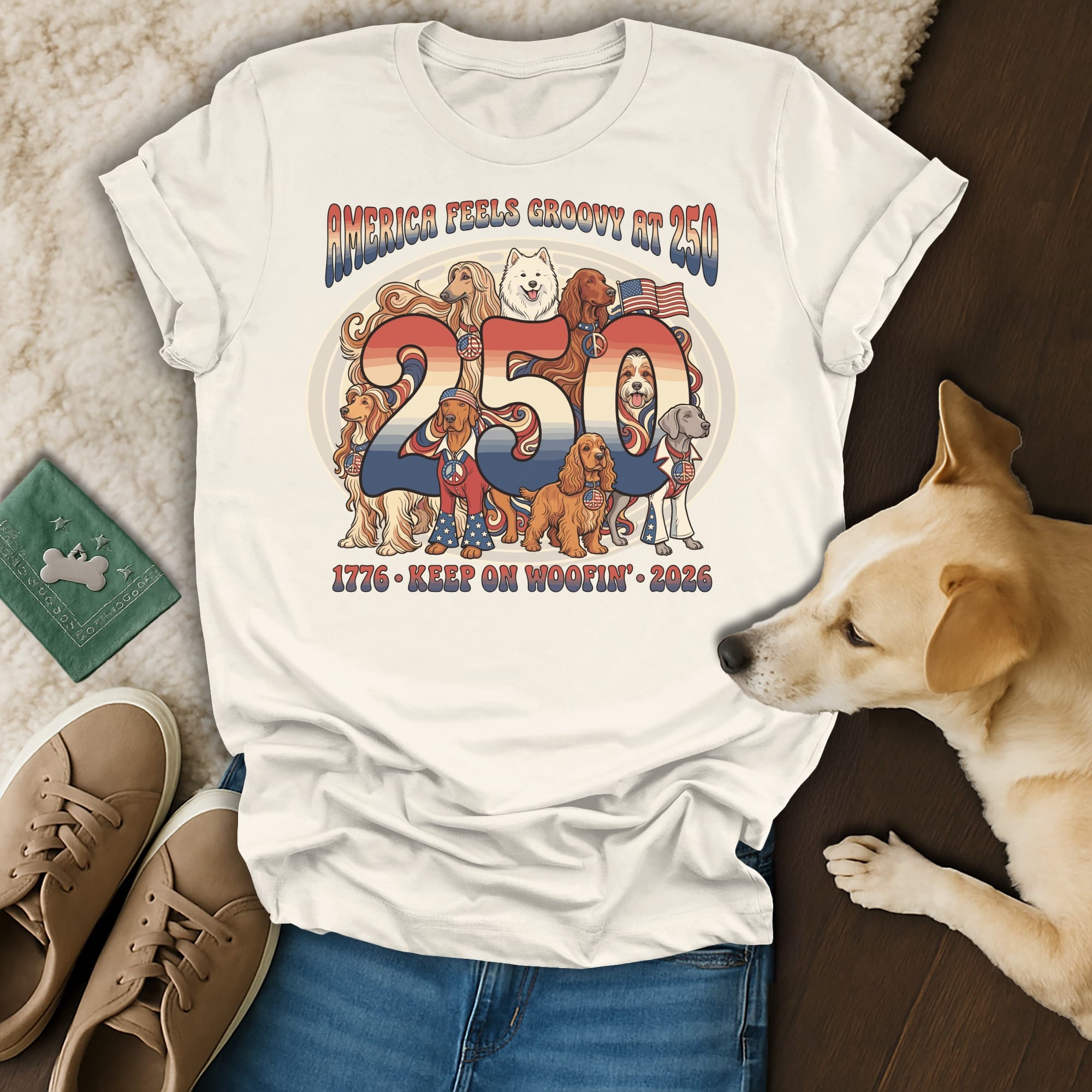 T-shirt with "America Feels Groovy BQ 250" and dogs celebrating 1776-2026.