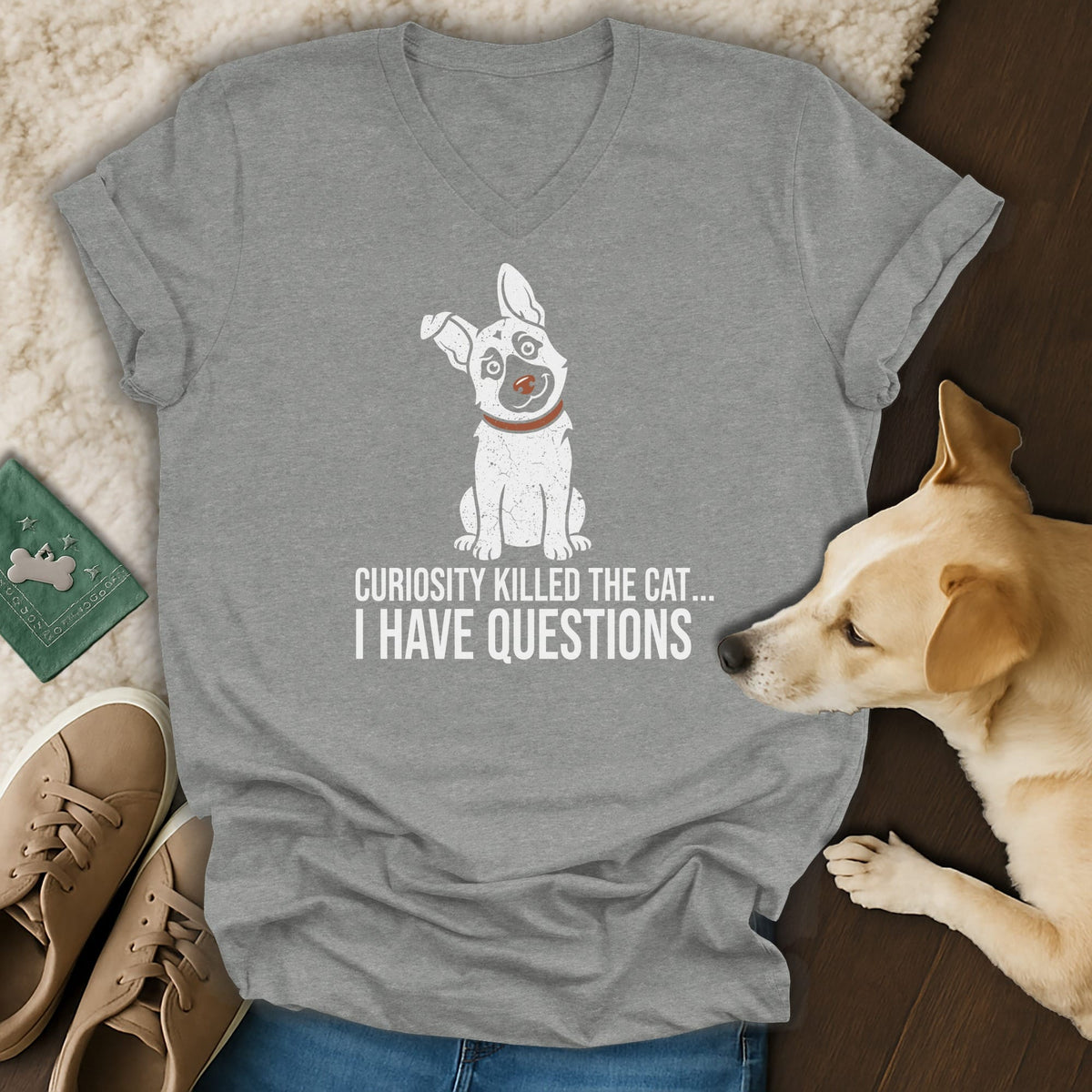 Grey t-shirt with graphic of dog and text "Curiosity killed the cat... I have questions."